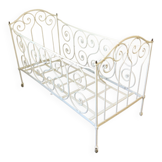 White wrought iron folding bed