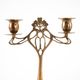 Art Nouveau brass candlestick with floral ornamentation, two arms, European