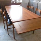 Table with two extensions and its 6 chairs scandinavian teak of the 1970s