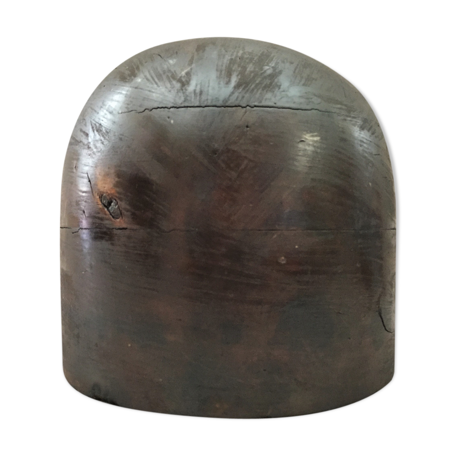 Old head with a wooden marotte hat 1950