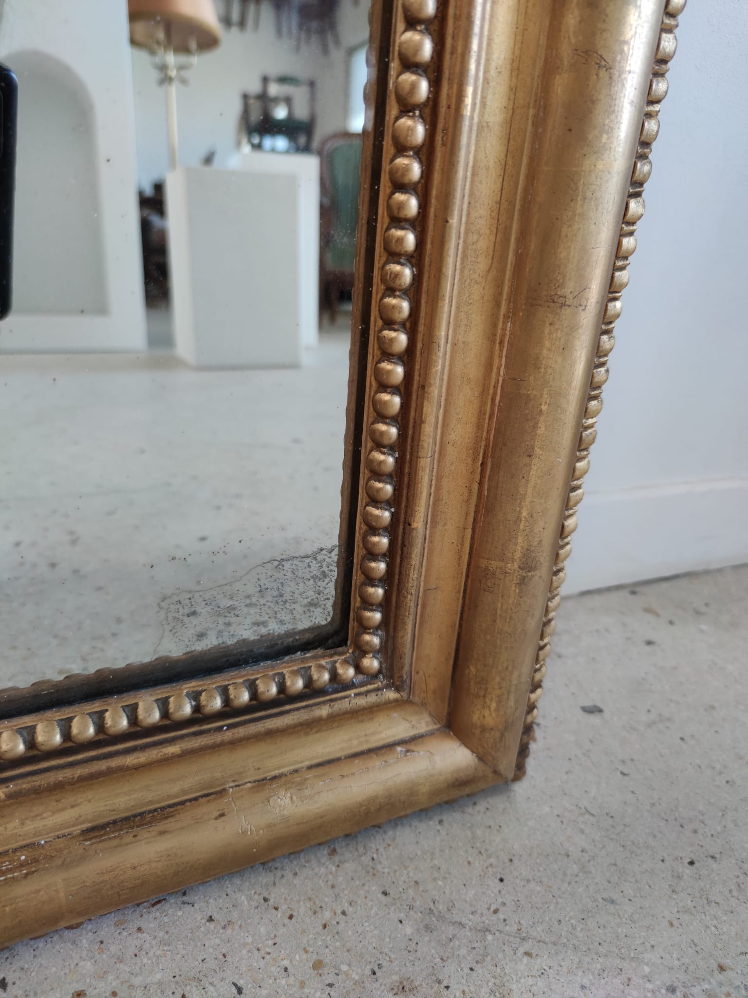 Louis Philippe gilded mirror with gendarme hat nineteenth H:130cm