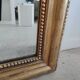 Louis Philippe gilded mirror with gendarme hat nineteenth H:130cm