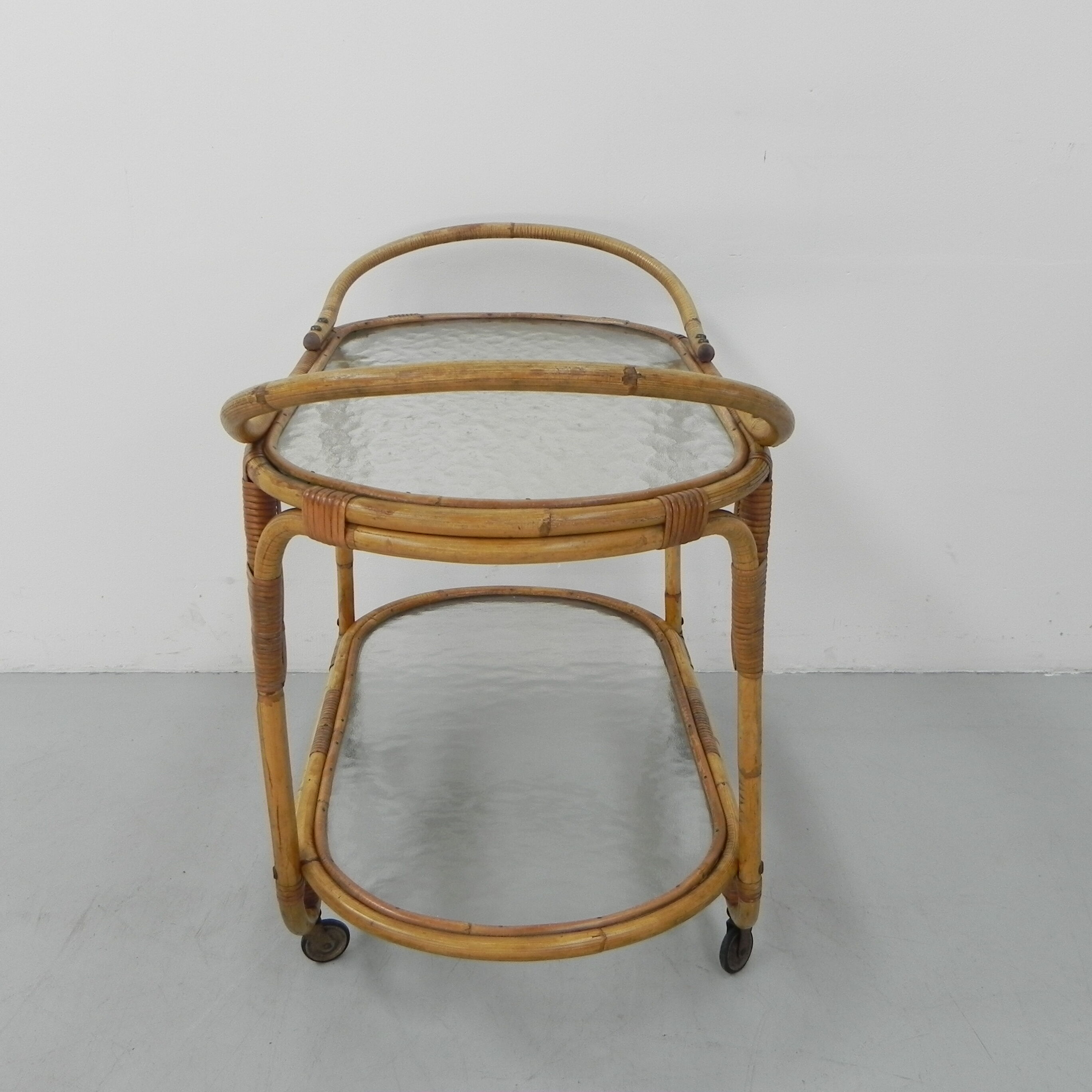 Bamboo, rattan serving trolley on castors