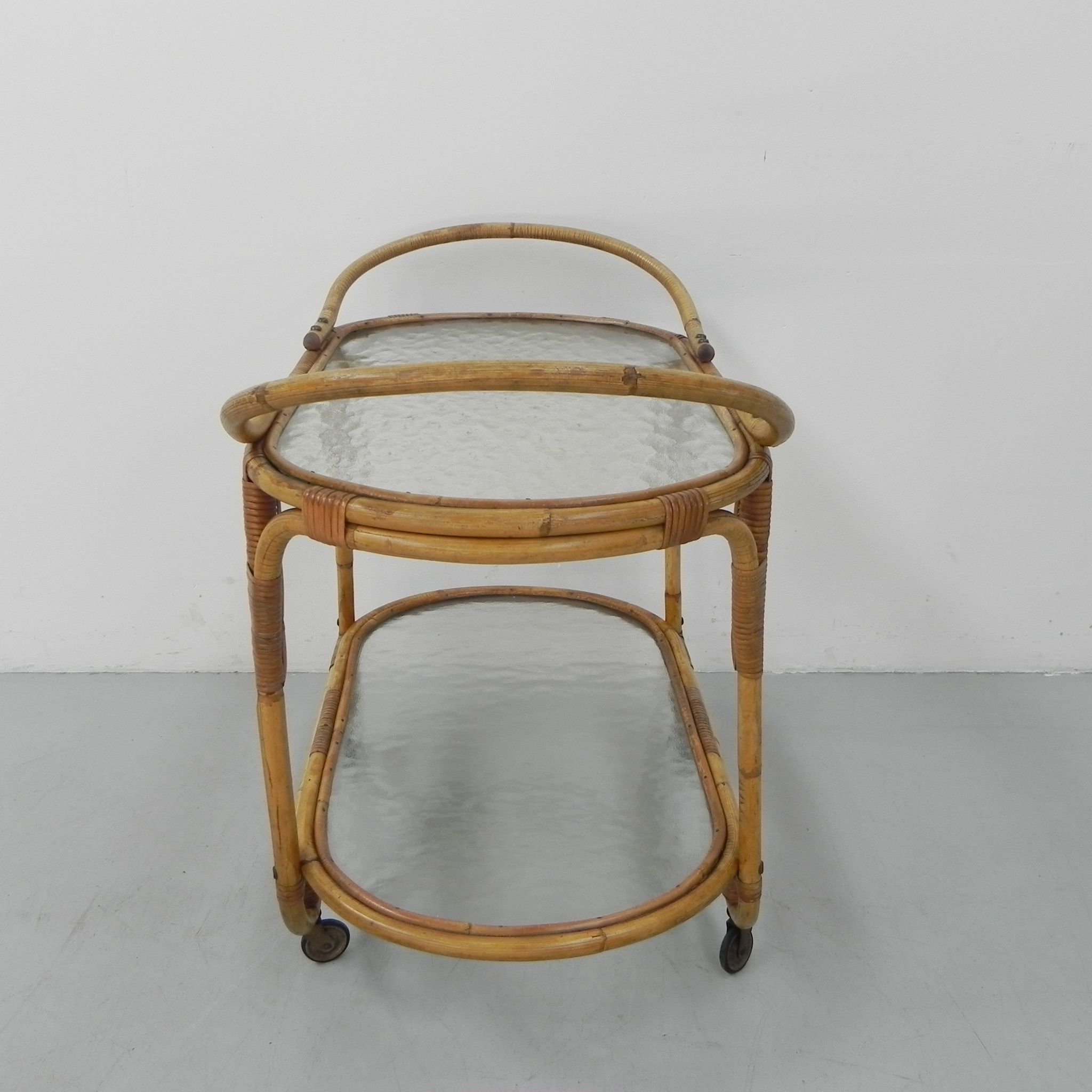 Bamboo, rattan serving trolley on castors