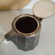 Old silver and wood teapot