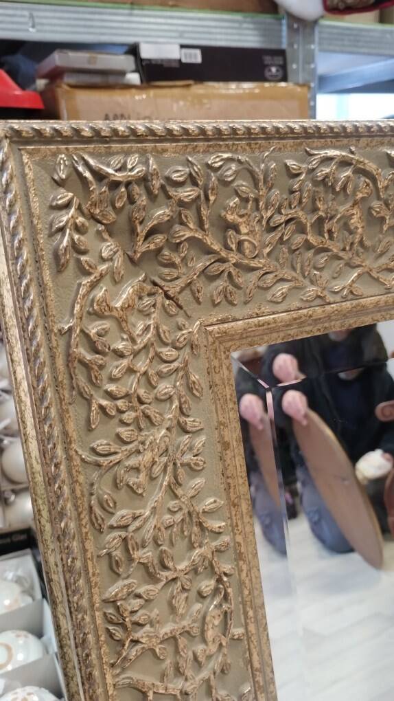 Rectangular mirror with its decorated frame