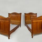 Art Nouveau twin beds in carved solid oak, France, circa 1910