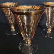 Set of three Hartzviller crystal glasses with golden stripes from the 50s and 60s