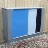 Showcase with sliding doors in painted wood
