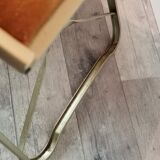 Two gold velvet folding chairs