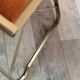 Two gold velvet folding chairs