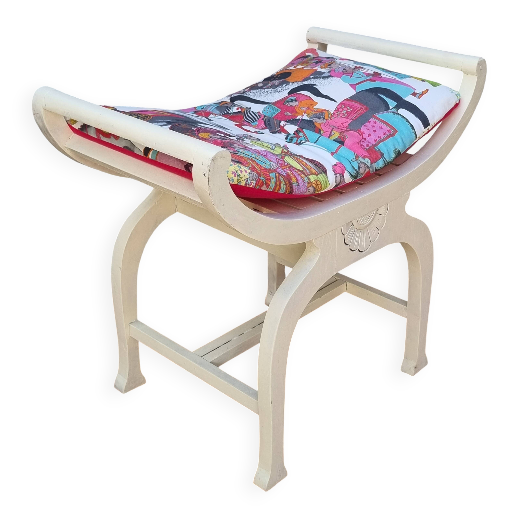 Curule stool in patinated carved wood, Manuel Canovas seat, 60 cm