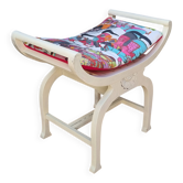 Tabouret curule en bois sculpté patiné, assise Manuel Canovas