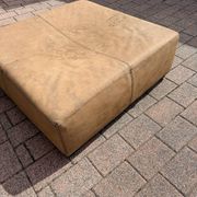 Large square pouffe in patinated nubuck leather – 100 × 100 cm