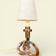 Pair of "Bretzel" lamps in lucite and brass, by Dorothy Thorpe (1901)