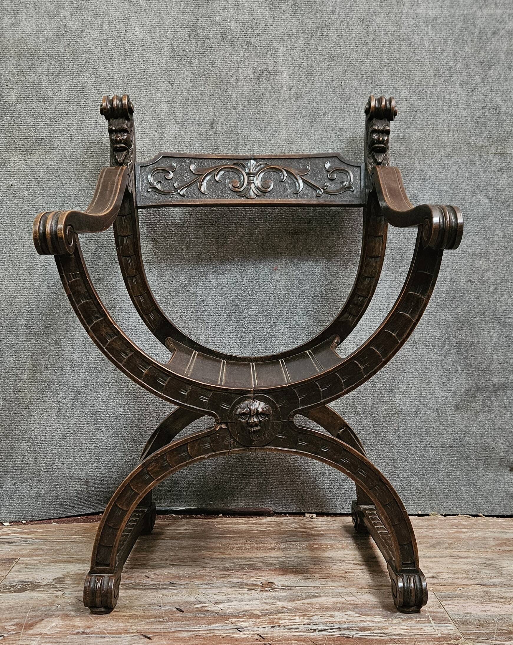 Antique curule chair in carved wood – Renaissance / Savonarole style