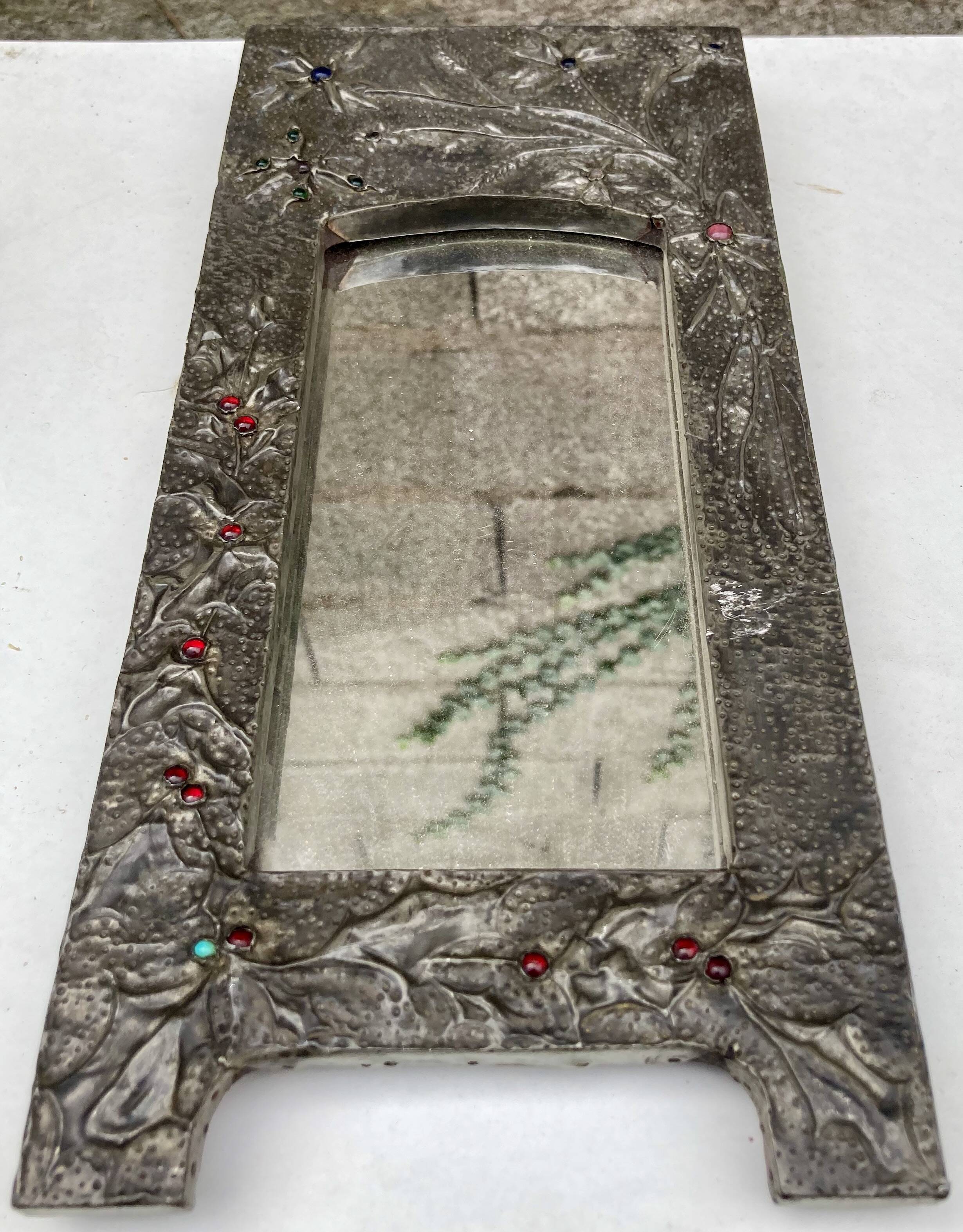 Mirror with embossed metal frame by alfred daguet, 1900s art nouveau period