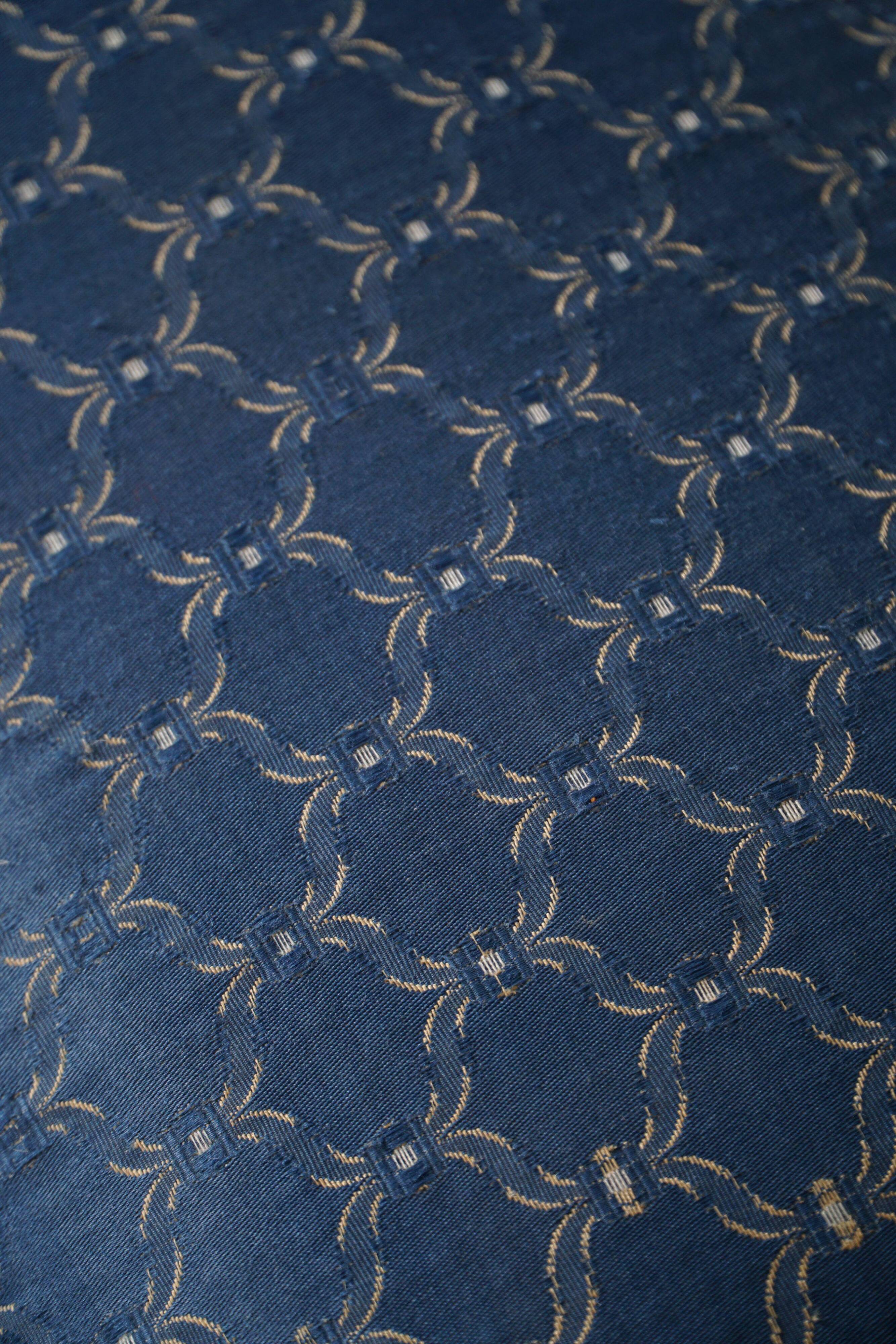 French Art Deco low stool with vintage upholstery made in the 1940s.