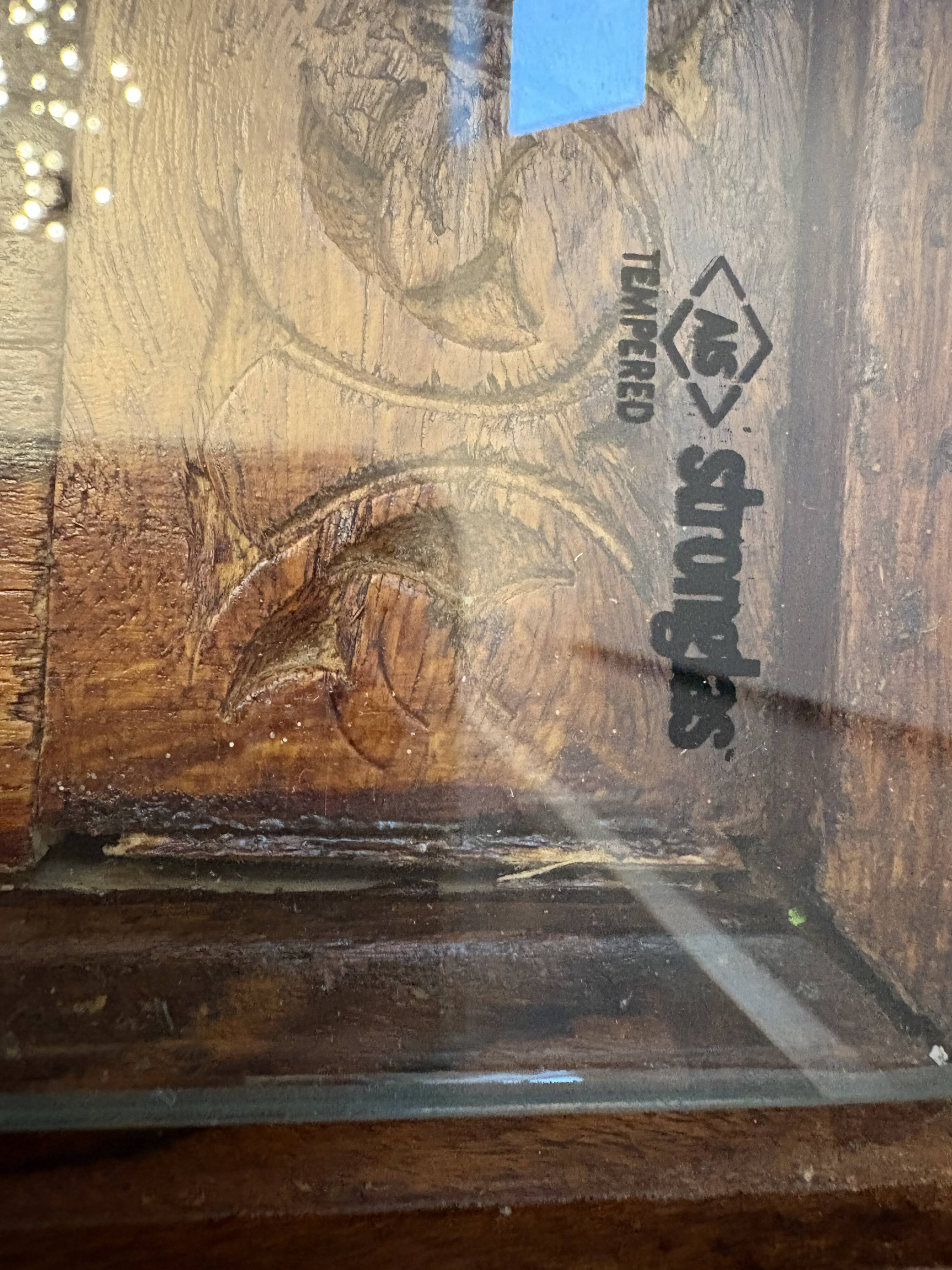 Solid oak carved coffee table with glass top