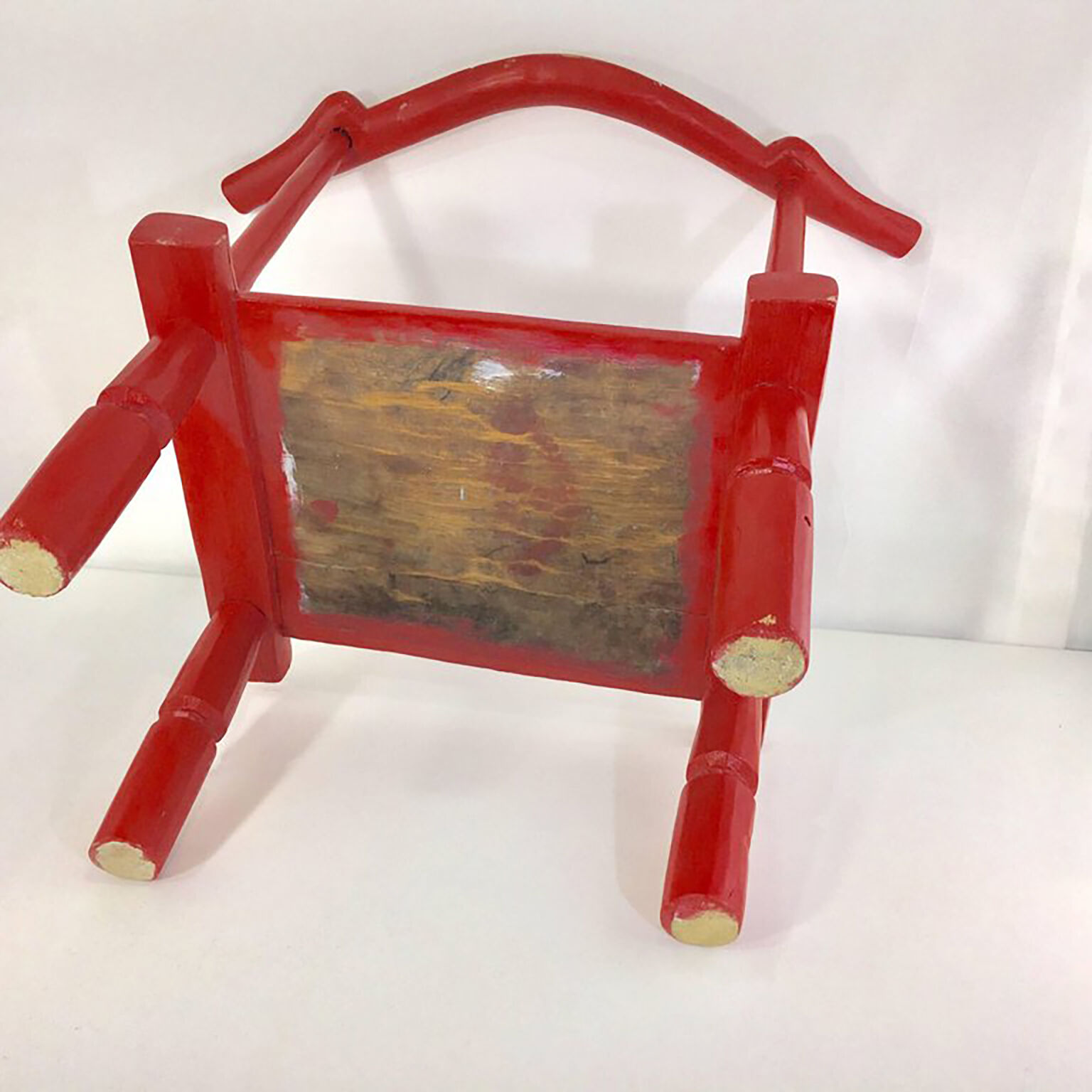 Old african baole red painted meditation chair