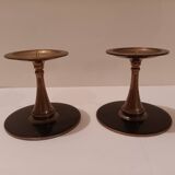 Pair of black brass candlesticks