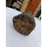 African statue of a woman, made of wood, brass, beads, and seashells.