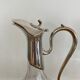 Glass decanters and silver metal spouts