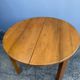 Table ronde en orme massif années 70 Maison Regain