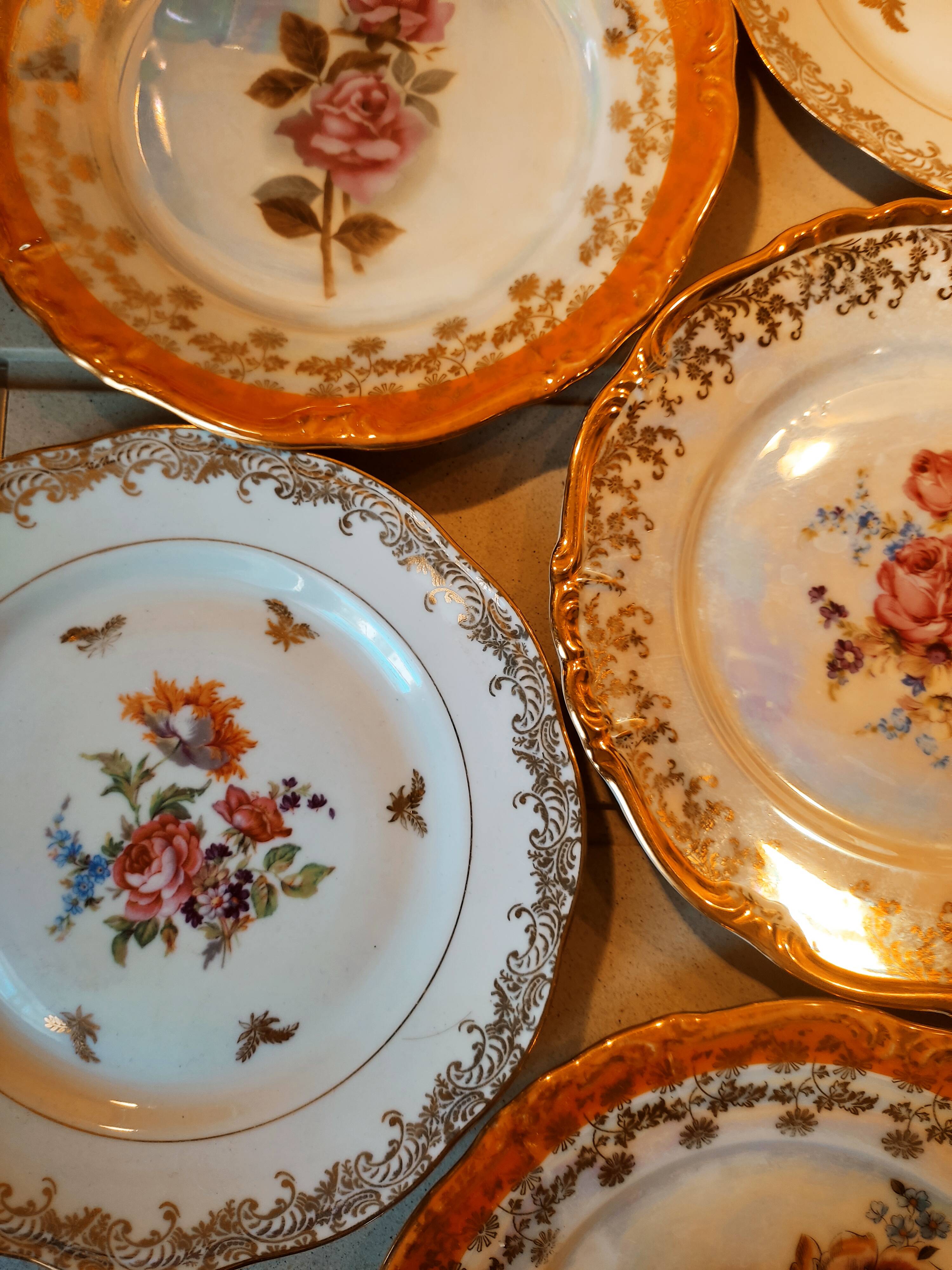6 mismatched dessert plates decorated with roses