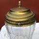 Glass cookie jar engraved metal frame brass