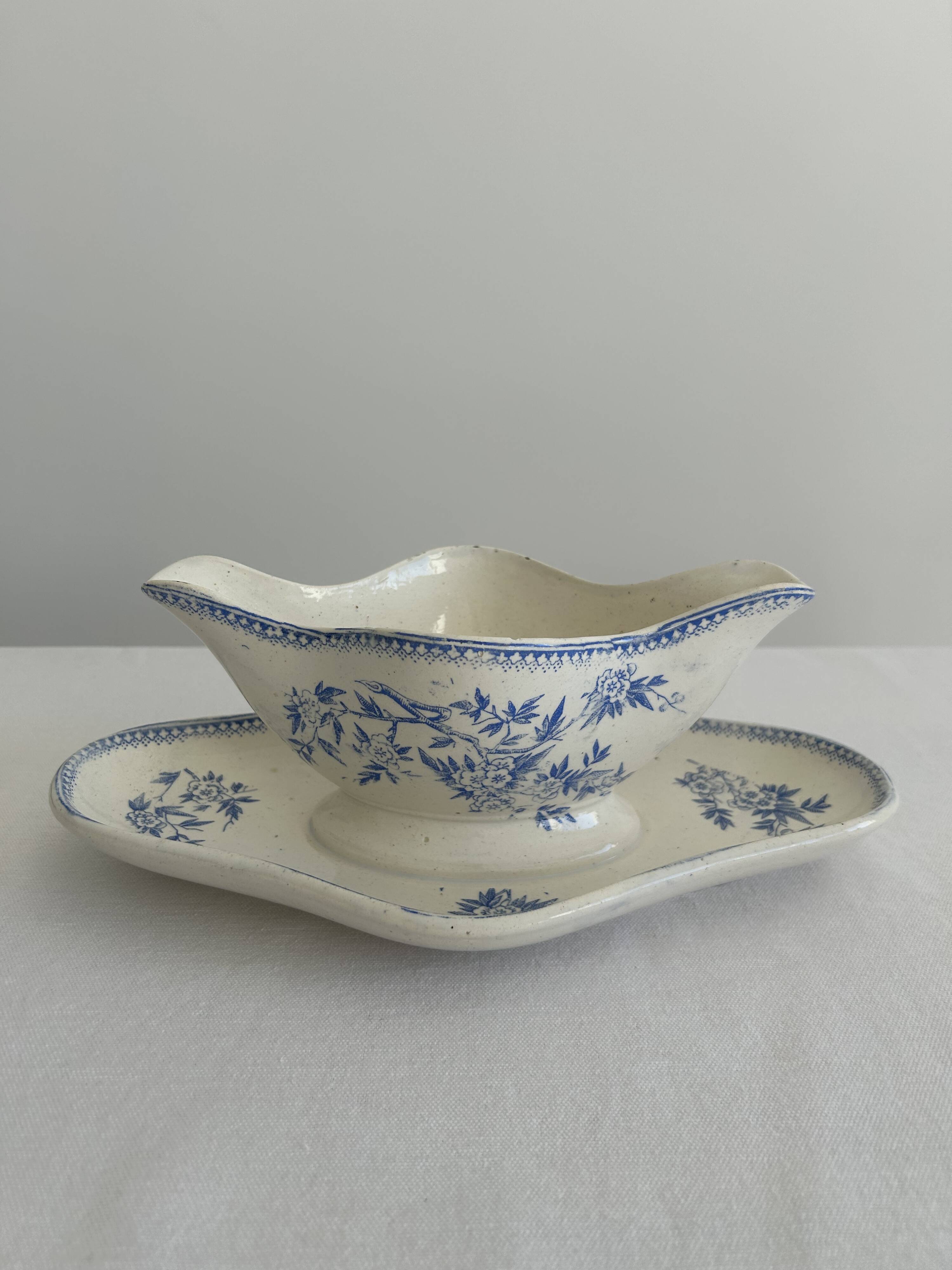 Antique sauce boat in earthenware – Grigny – blue floral decoration
