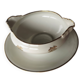 Sells sauceboat Elegant decoration of small golden roses,
