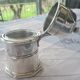 Table container from Christofle in silver-plated metal.