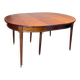 Dining table with a mahogany band in louis xvi style