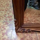 Mirror in golden wood