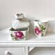 Limoges porcelain toiletry bottles decorated with roses