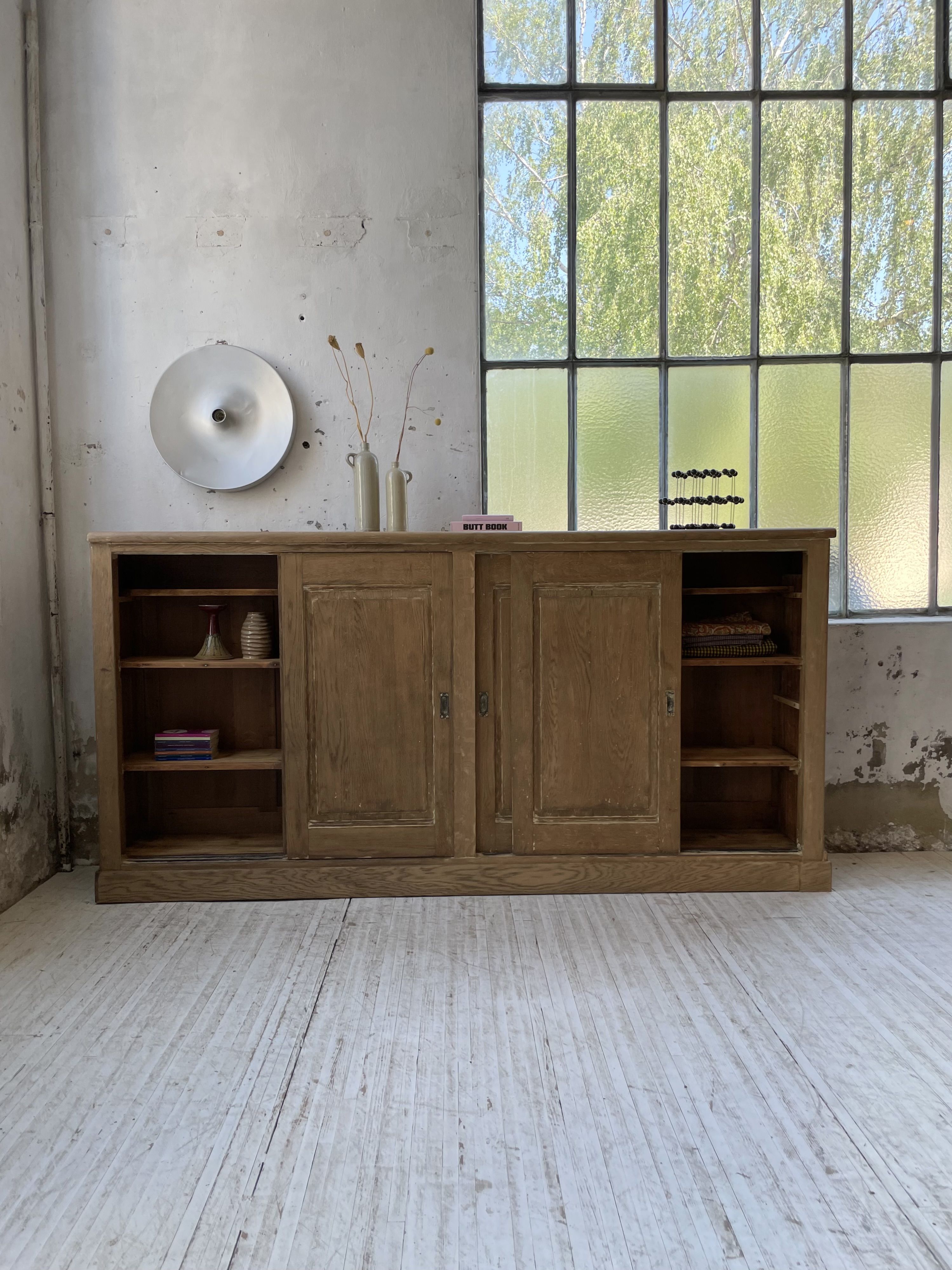 Large row of solid oak loom sliding doors