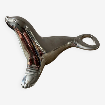 Vintage sea lion bottle opener in silver metal Germany