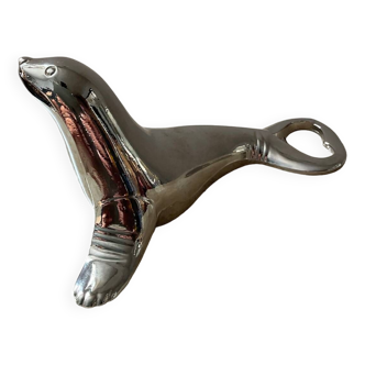 Vintage sea lion bottle opener in silver metal Germany