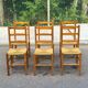 Set of 6 brutalist style chairs in solid pine and woven straw from the 1970s.