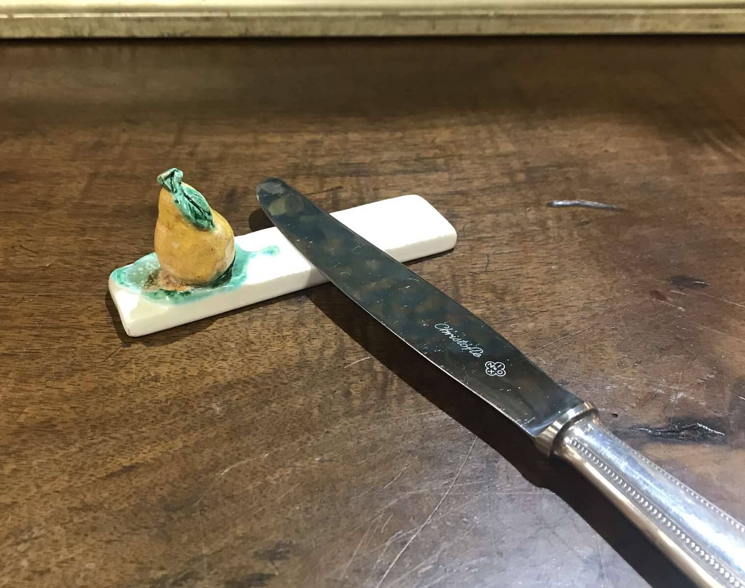 Set of 9 fruit-decorated knife rests from the 1930s.