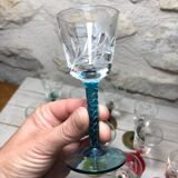 Antique and rare! Sold in a set of 12 colorful twisted stemmed glasses engraved with flowers and leaves