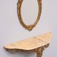 Classic gilded brass console with oval mirror from the 1950s, Italy.