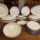 Limoges porcelain table service with blue band on white and gold background