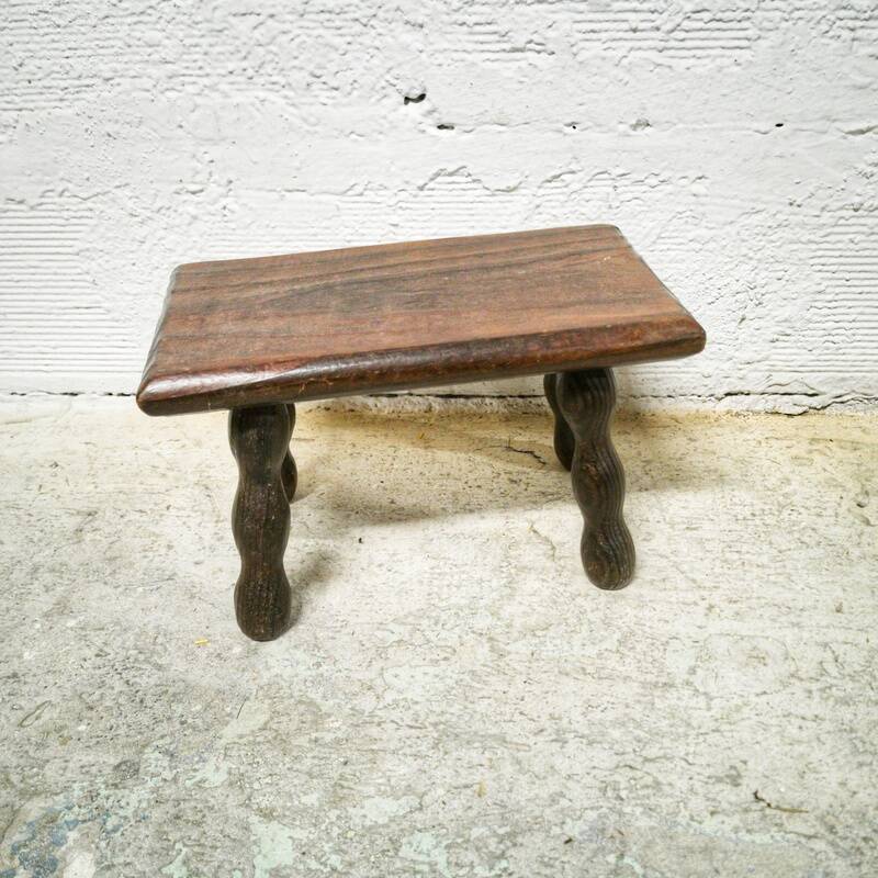 Turned wooden footrest