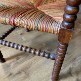Corner armchair in beaded wood straw