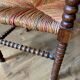 Corner armchair in beaded wood straw