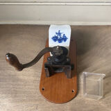 Old wall-mounted coffee grinder