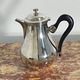 Saint Hilaire teapot in silver-plated metal, with a blackened handle.