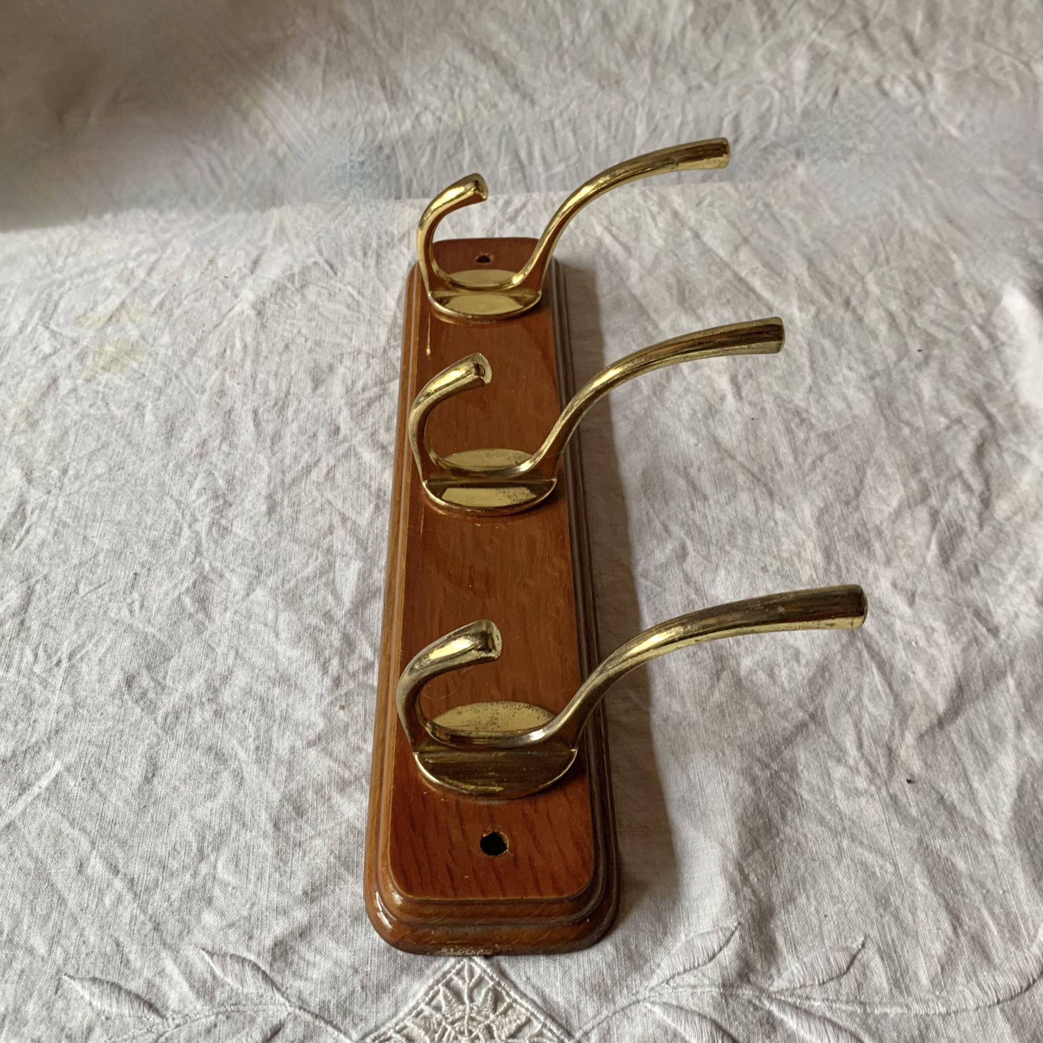 Vintage wall coat rack in lacquered wood - 3 golden hooks